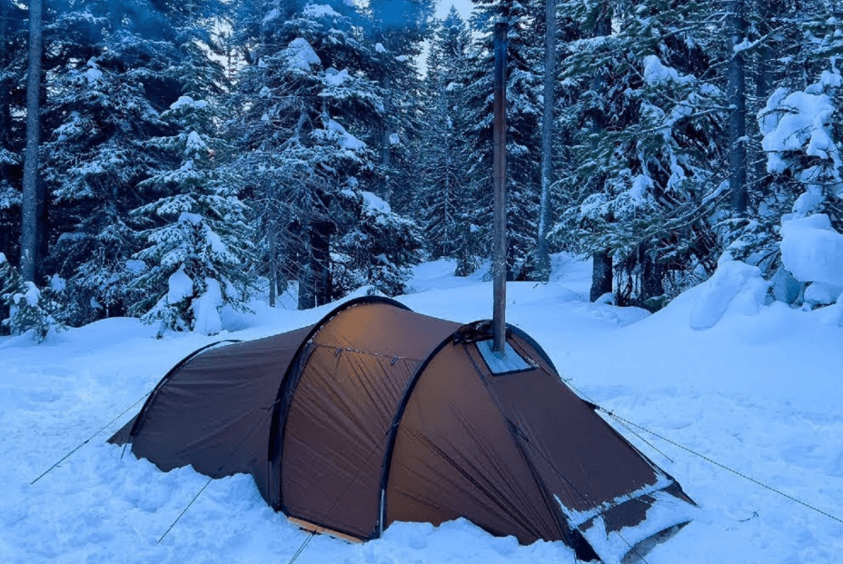 Winter backpacking tent in snow